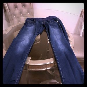 Blue Jean jeggings distressed denim jeans.